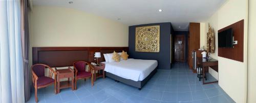 Katil atau katil-katil dalam bilik di Blue Beach Apartment