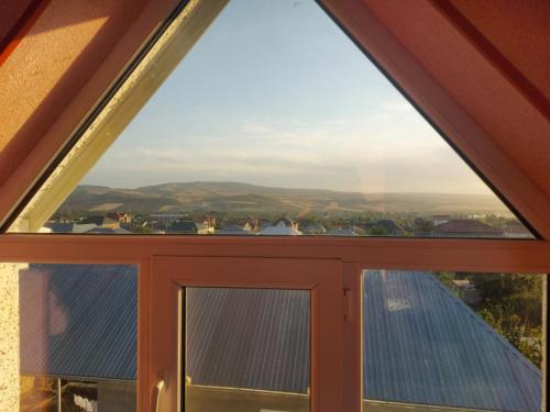 a view from the window of a house at SUNRISE Guest House in İsmayıllı