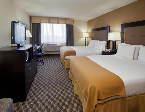 Postel nebo postele na pokoji v ubytování Holiday Inn Express Union City San Jose by IHG