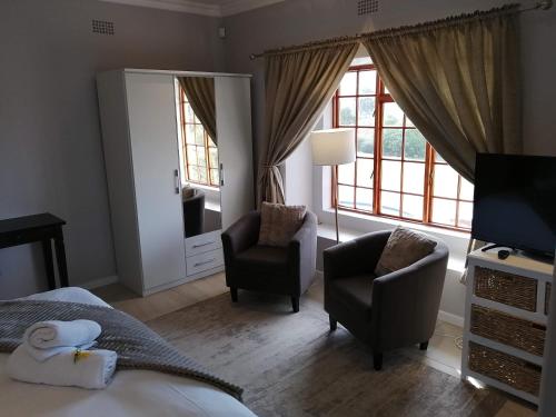 Ένα ή περισσότερα κρεβάτια σε δωμάτιο στο Lauradale Accommodation