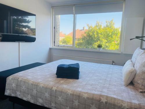 Ένα ή περισσότερα κρεβάτια σε δωμάτιο στο Home Inn Zandvoort the First Floor 4 Persons, 2 bedrooms, Free Parking!
