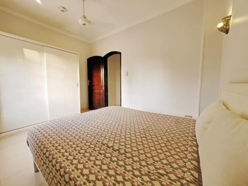 Ένα ή περισσότερα κρεβάτια σε δωμάτιο στο IN LUXOR Nile Apartments