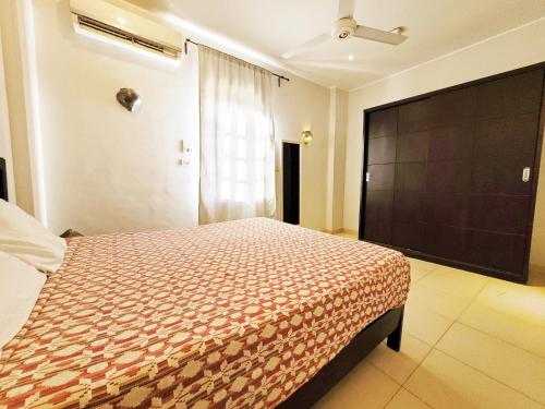 Ένα ή περισσότερα κρεβάτια σε δωμάτιο στο IN LUXOR Nile Apartments