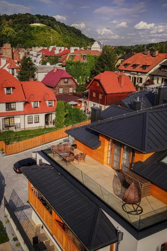 an aerial view of a city with solar roofs at Willa Kazimierz Dolny in Kazimierz Dolny