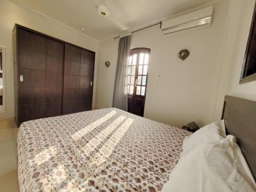 Ένα ή περισσότερα κρεβάτια σε δωμάτιο στο IN LUXOR Nile Apartments