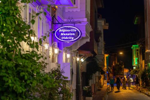 a purple sign on the side of a building at Begonville Mansion Oldcity in Istanbul