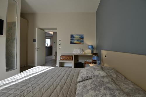 מיטה או מיטות בחדר ב-Daman Rooms & Breakfast