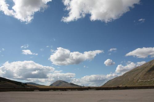 a view of the mountains and sky with clouds at Casa Vacanze Antico Poggio in Poggio San Giovanni