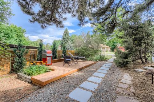 a backyard with a wooden deck and a gas station at 1815 Bluebell Ave in Boulder