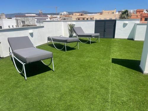 Jardín al aire libre en Apartamento de lujo con piscina en Tarifa