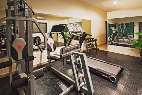 a fitness room with a gym with tread machines at Holiday Inn Panama Canal, an IHG Hotel in Panama City