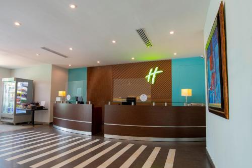 a lobby of a hospital with a waiting room at Holiday Inn Panama Canal by IHG in Panama City