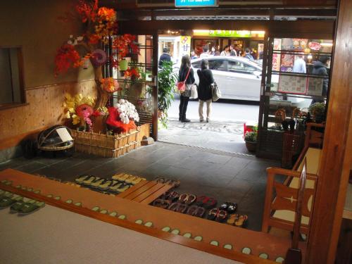 a view of a store with people walking down the street at Morizuya in Toyooka