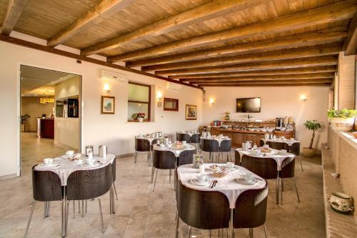 En restaurant eller et andet spisested på Hotel Roma Tiburtina Metro