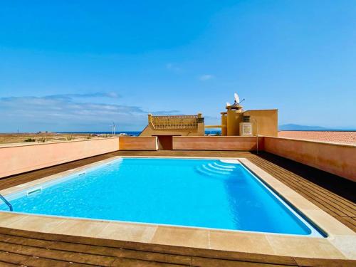 The swimming pool at or close to Rooftop Pool Apartment Corralejo