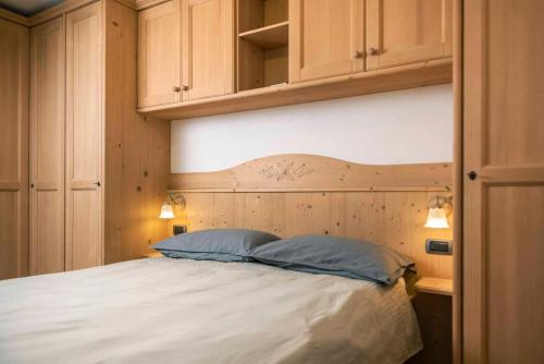Posteľ alebo postele v izbe v ubytovaní Casa Rododendro - Cavalese Dolomites