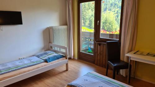 Postel nebo postele na pokoji v ubytování My Appartement - Haus Waldeck