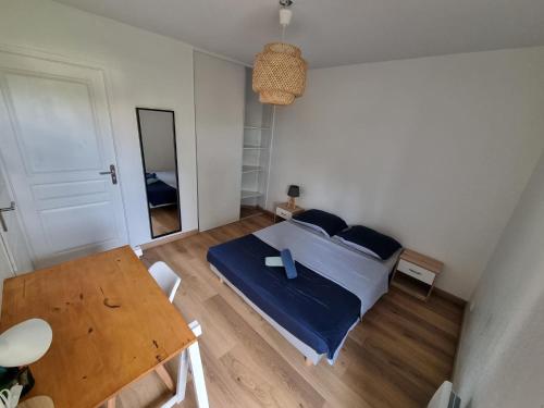 Posteľ alebo postele v izbe v ubytovaní Appartement 2 pièces de Charme à d'Annemasse.