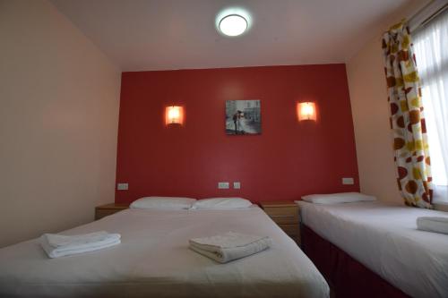 Cama o camas de una habitación en Cranbrook Hotel