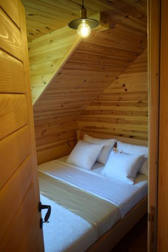 Cama ou camas em um quarto em Vila Bridge Tara