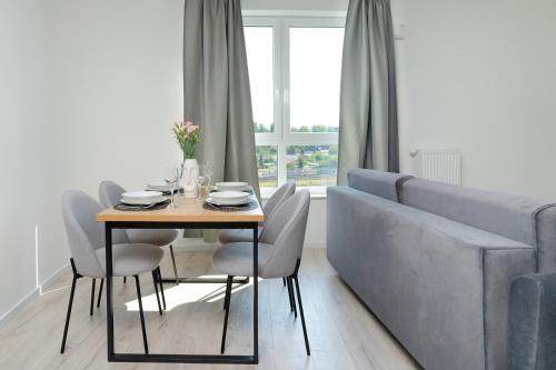 Χώρος καθιστικού στο Symphony Modern Tower Apartamenty