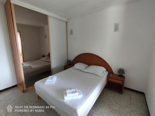 Ένα ή περισσότερα κρεβάτια σε δωμάτιο στο A casa di Sognu