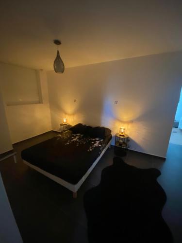 Llit o llits en una habitació de Casa Bibou