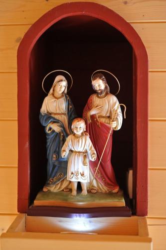 a statue of airgin and a child in a niche at Bernadette' Cosy Flat - 3 minutes walk main door to sanctuary entrance- Old Town - Bernadette de Soubirous's neighborhood - Chapel for Prayer on site in Lourdes