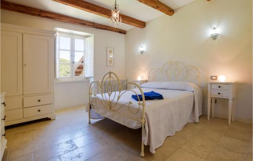 a bedroom with two beds and a window at Beautiful Home In Loc, Spicciano With Outdoor Swimming Pool in Terenzano
