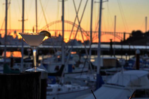 a martini glass with a lime in a marina at Embarcadero Resort in Newport