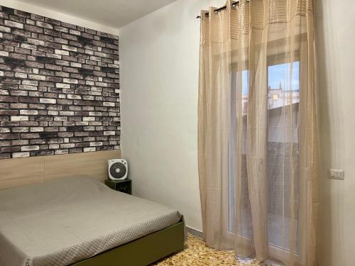 Postel nebo postele na pokoji v ubytování CASA VACANZE REFUGIUM & LOUNGE Ferienwohnung