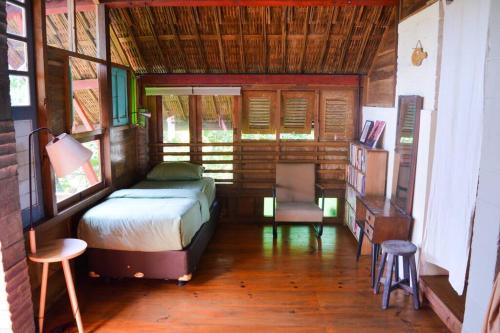 Krevet ili kreveti na kat u jedinici u objektu Rumah Wardani