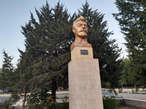 a statue of a bust of a man at Azimut in Jalal-Abad
