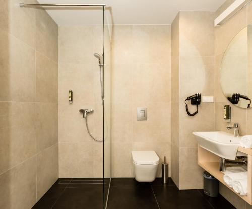 Ванна кімната в Sleep in Hostel & Apartments Stare Miasto