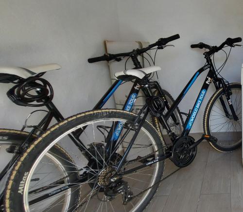 two bikes parked next to each other in a room at Casa 37 - Country Home in Terrugem