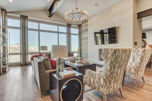 a living room with a couch and a table at Four Bedroom Penthouse apartment hotel in Park City