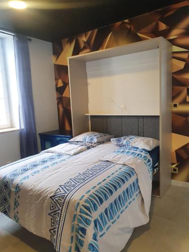 Postel nebo postele na pokoji v ubytování Bourg St Hilaire