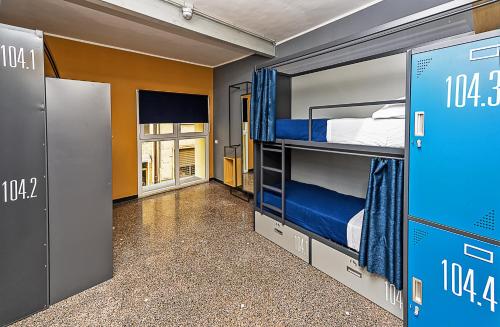 Postel nebo postele na pokoji v ubytování Marathon Hostel