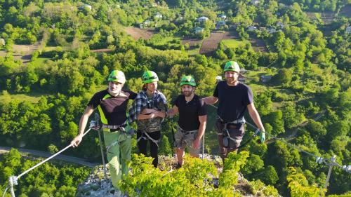 a group of men standing on top of a mountain at Sveri Adventure Camp in Chiatʼura