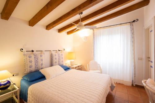 Katil atau katil-katil dalam bilik di BGItalianVacation - Domus di Pitrizza