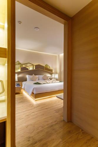 W1Bangkoknoi Hotelにあるベッド