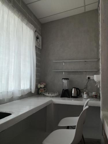 Φωτογραφία από το άλμπουμ του H&T Vintage Decor Homestay σε Ipoh