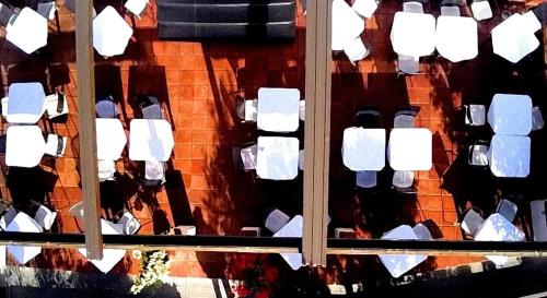 an overhead view of a group of white toilets at Hotel Pop in Cala Gonone