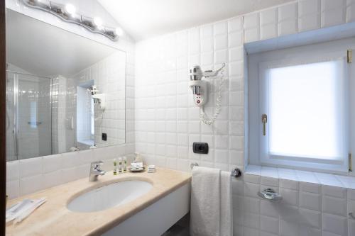 Ванная комната в Hotel du Lac Varenna
