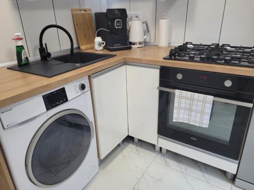 Dapur atau dapur kecil di Apertament JOWISZ