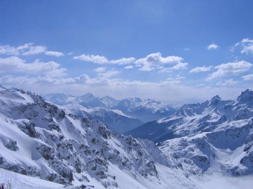 a view of a snow covered mountain range at Résidence des Thermes in Allevard