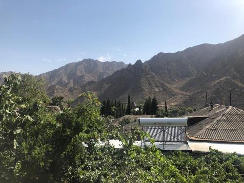 a building with a view of a mountain at Haer B&B in Meghri