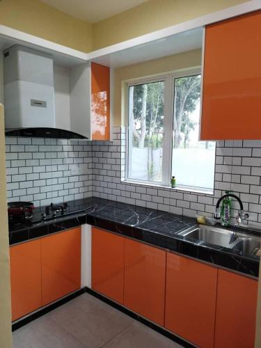 Una cocina o zona de cocina en Laman Jubilee DBayu