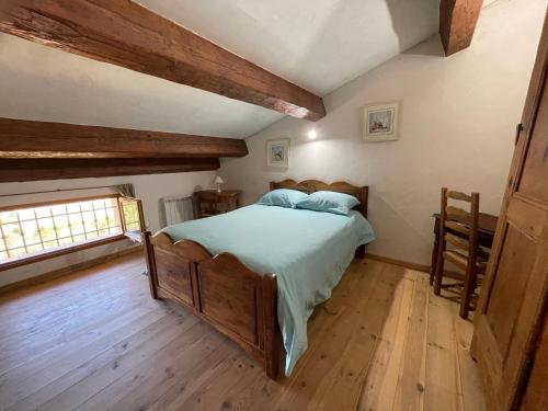 Giường trong phòng chung tại Le Castellaras - La Manonegra - Entre mer et montagne, endroit typique, nature, calme