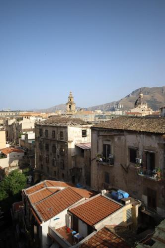 an aerial view of a city with buildings at Le Cupole Design in Palermo